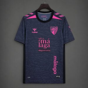 26/27 Málaga CF Tercera equipación morado oscuro y rosa con estampado de texto